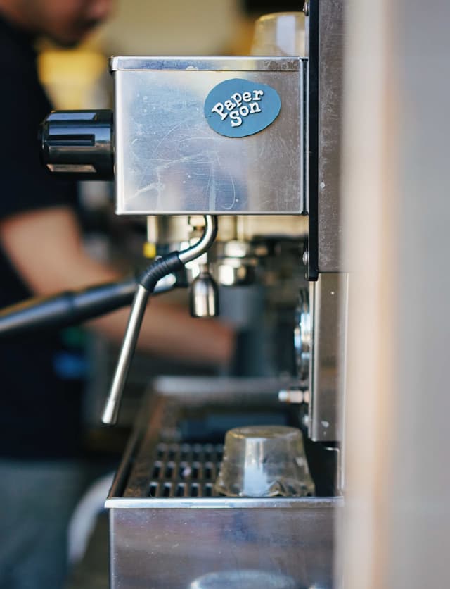 Espresso machine at the window.