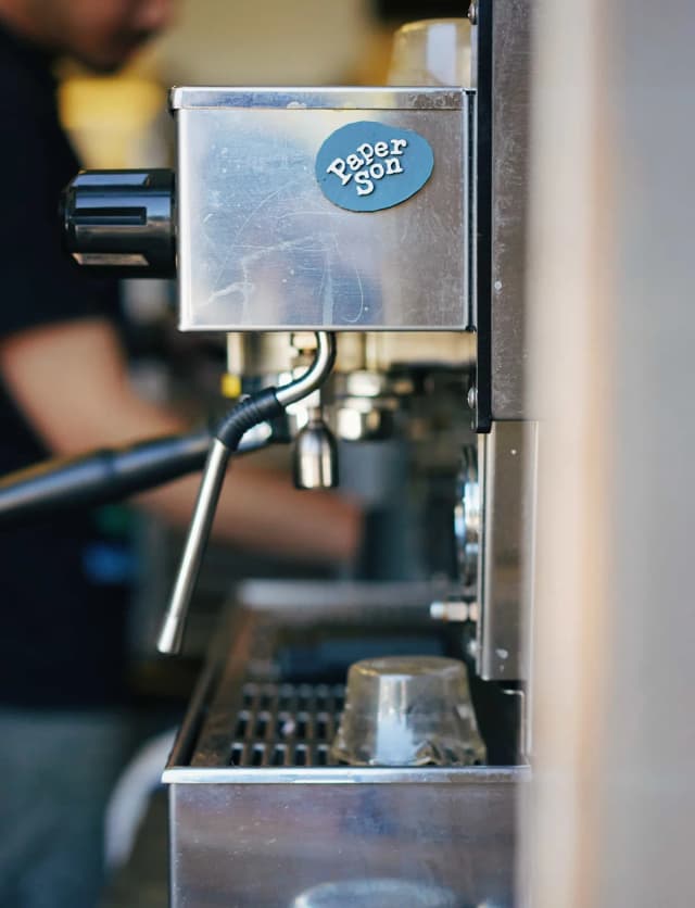 Espresso machine at the window.